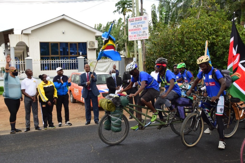 Official flag-off ceremony as cyclists depart with East African Community and Kenyan flags